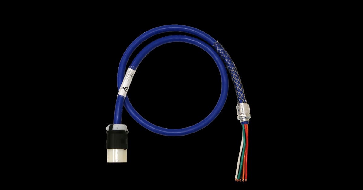 A blue coiled cable with a black and white plug, metal connector, and exposed red, green, and orange wires.
